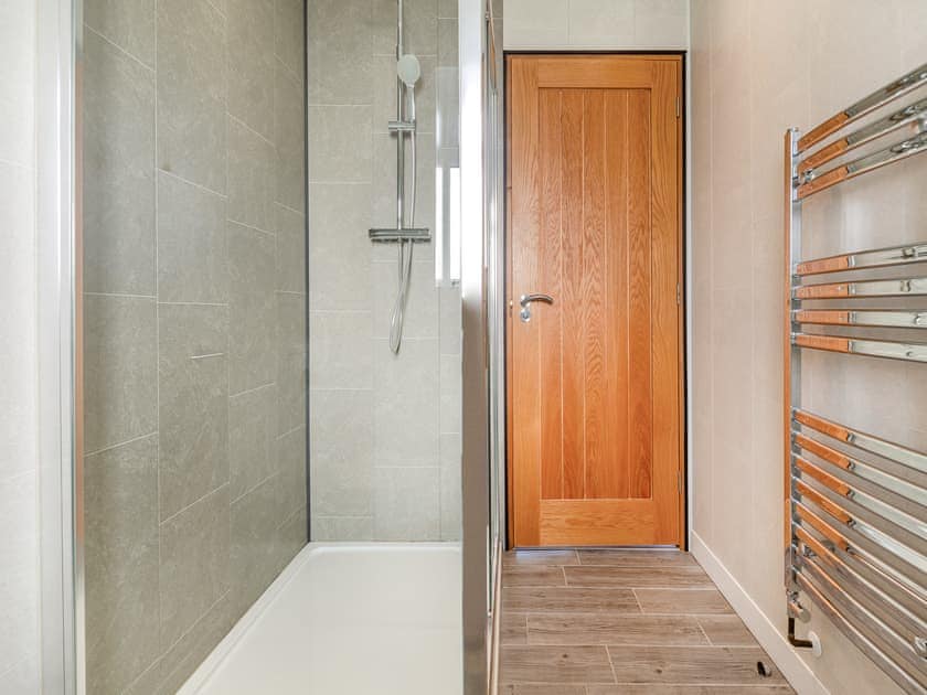 Shower room | Math Cottage - Bryn Awel Caravan Park, Pentraeth