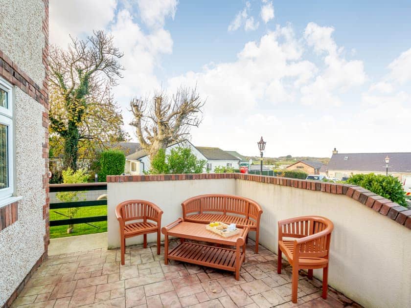 Outdoor area | Math Cottage - Bryn Awel Caravan Park, Pentraeth