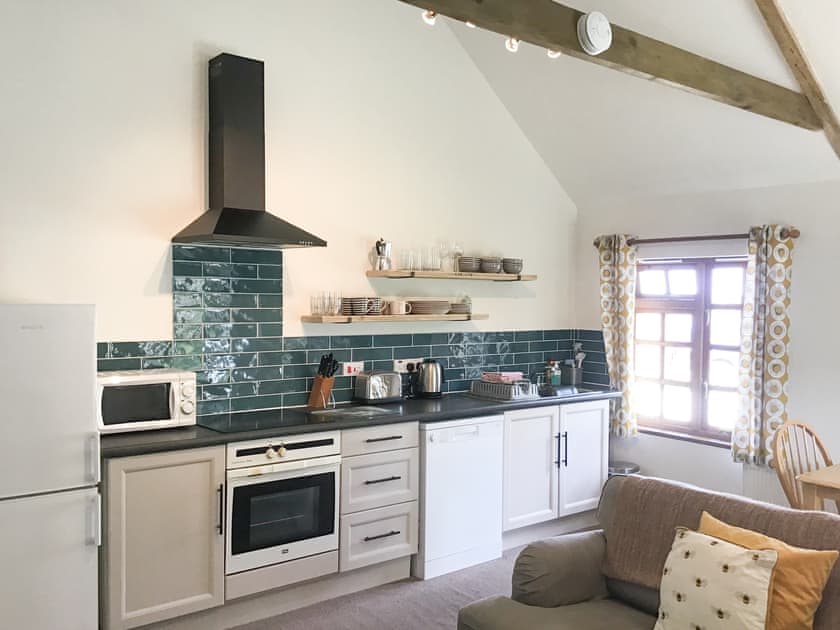 Kitchen area | Honeysuckle Cottage - Great Trevillian Farm Barns, Warbstow, near Crackington Haven