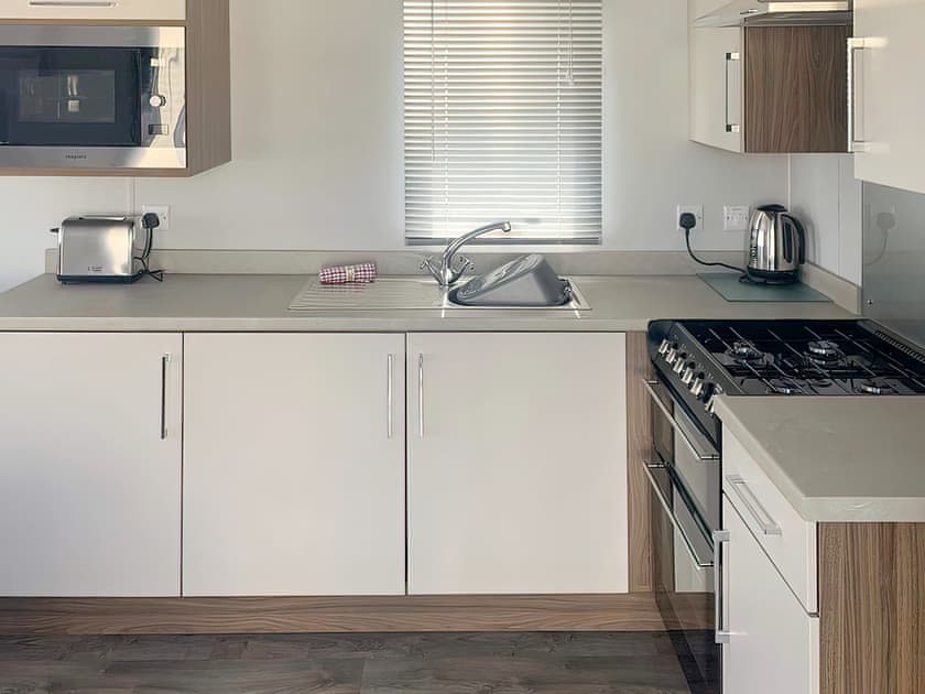 Kitchen area | Watton’s - 31 Hawk - Wattons, Morfa Bychan