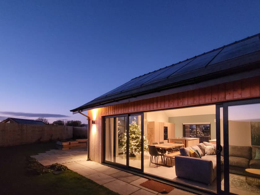 Bifold doors, living area and kitchen | Marsh Marigold Cottage - Ashlin Farm Barns, Dunholme, near Lincoln