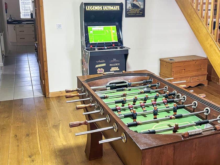 Games room with free to play Arcade Machine and Football Table | Steamer Quay Cottage, Paignton