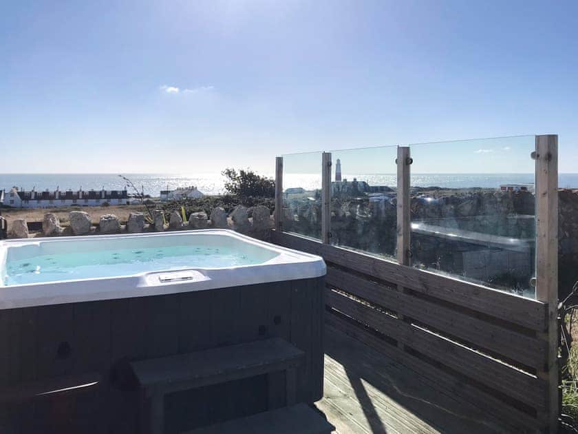 Relaxing hot tub with wonderful sea views | The Old Boathouse, Portland, near Weymouth