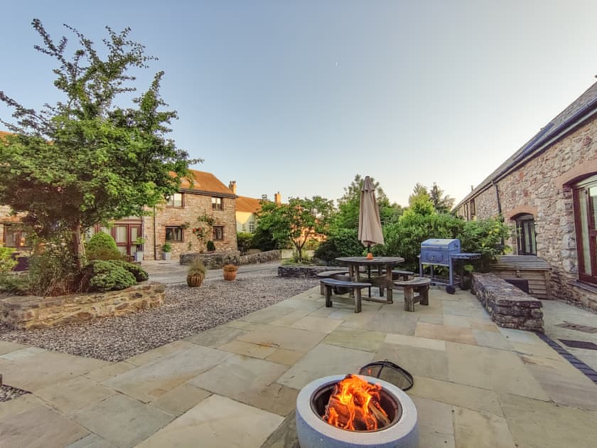 Fire-pit on the patio | Swift - Newhouse Barton, Ipplepen, near Totnes