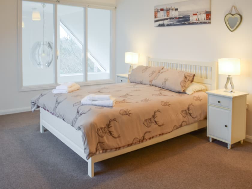 Master with dual aspect windows, one overlooking Living room | Shorehills, Carradale East, near Campbeltown