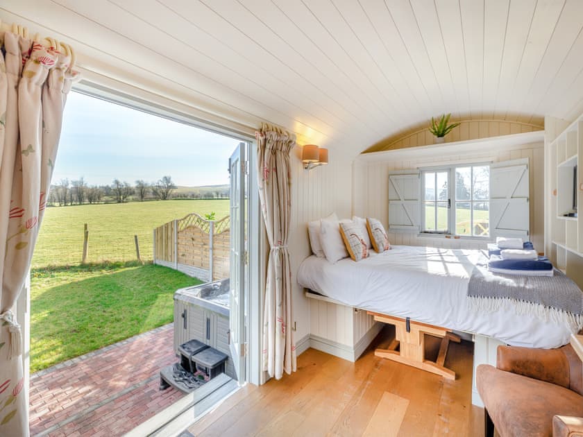 Interior with double bed set up | Sunflower - Llawrllan, St Harmon, near Rhayader