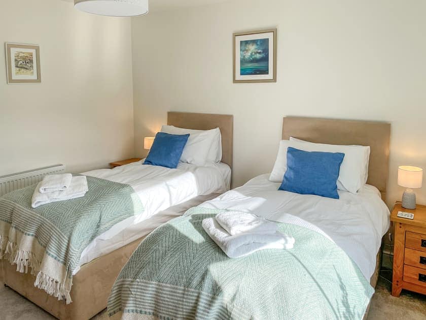 King size bed made into a twin  | Bluebell House, Tenby
