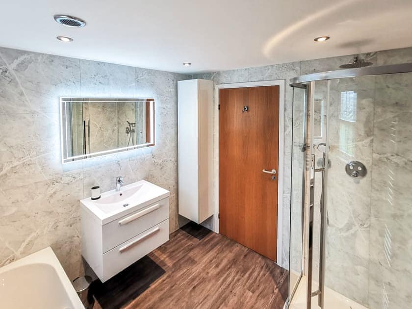 Family bathroom with shower enclosure and bath | Paddock House, Middleham, near Leyburn