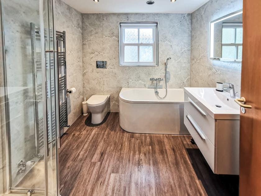 Family bathroom with shower enclosure and bath | Paddock House, Middleham, near Leyburn