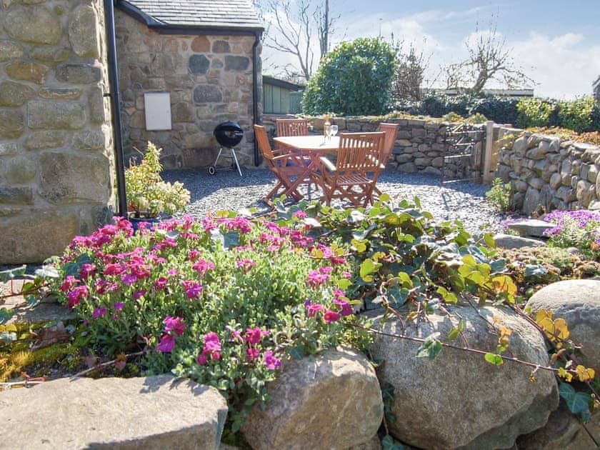 Sitting-out-area | Anneddle Talybont Cottage, Tal Y Bont
