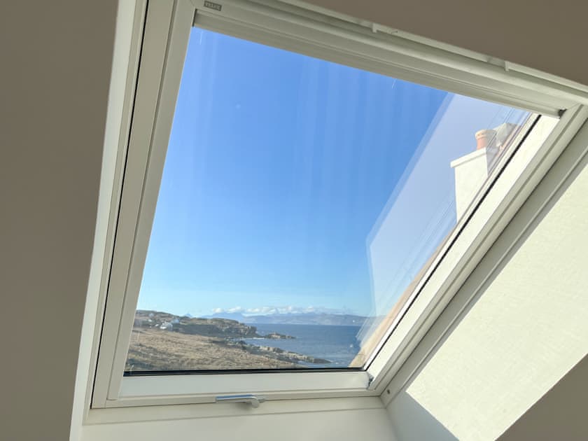 Views of the Cullins of Skye and Raasay from new twin bedroom Velux window | The Old School House, Applecross