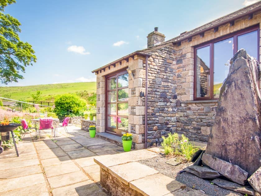 Outdoor area | Coomb View Barn - Sandbeds Holiday Cottages, Grayrigg, near Kendal
