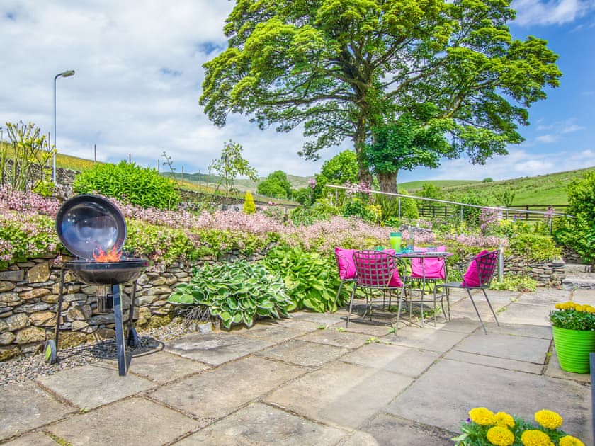 Outdoor area | Coomb View Barn - Sandbeds Holiday Cottages, Grayrigg, near Kendal