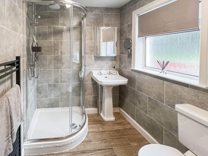 Shower room with waterfall electric showe, underfloor heating and heated towel rail | Riverside Cottage, Drumnadrochit, near Loch Ness