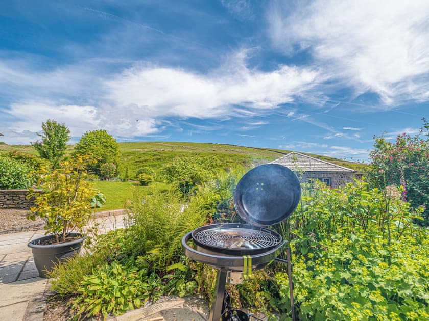 Patio | Sandbeds Farmhouse - Sandbeds Holiday Cottages, Grayrigg, near Kendal