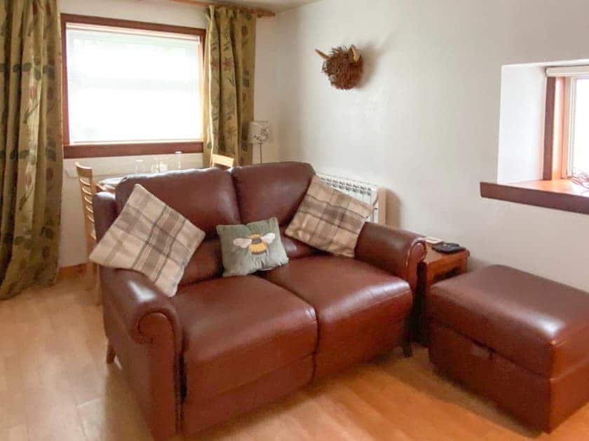 Recliner sofa with charging points, perfect for movie nights ( Prime and Sky included or use your own Netflix account)  | Riverside Cottage, Drumnadrochit, near Loch Ness