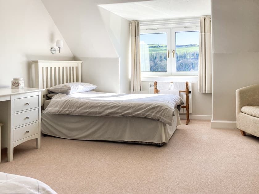 Twin bedded room with sloping ceilings | Balnowlart Lodge, Ballantrae, near Girvan