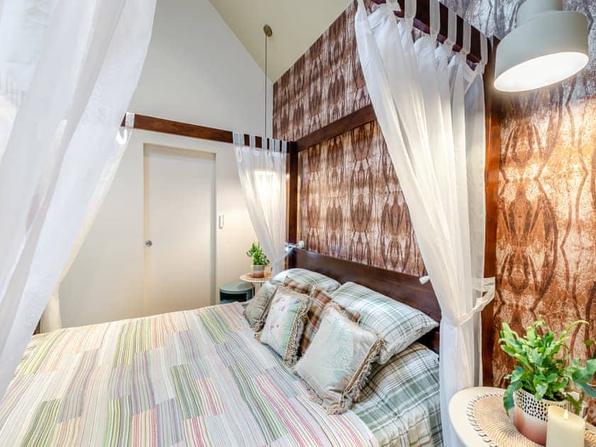 Four Poster bedroom | The Stables, Alston, near Preston