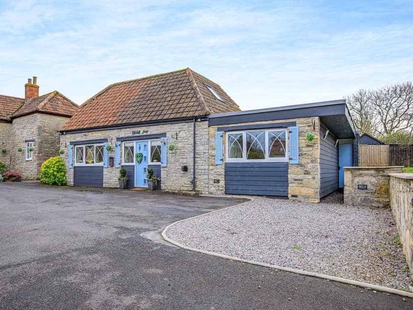 Two private parking bays can be seen on the right of the property | Bluebell House, Compton Dundon