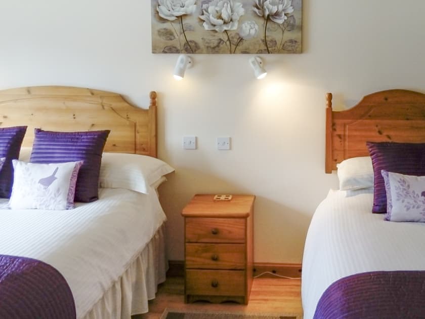 Bedroom with a double and a single bed | Waterside - Mullardoch Cottages, by Inverinate, Kyle