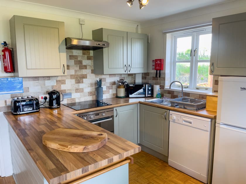 Kitchen area | Wheel - Canllefaes Cottages, Penparc