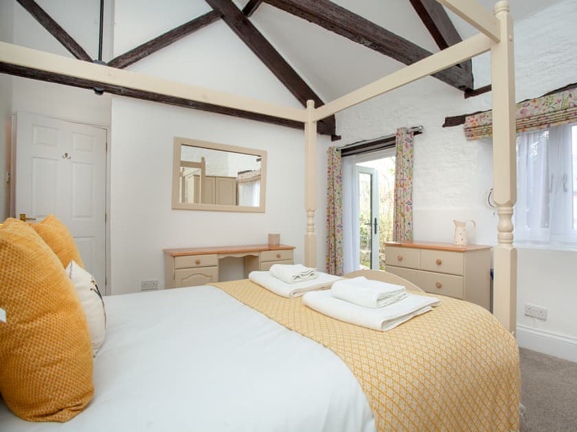 Four Poster bedroom | Rose Cottage - The Old Mill Cottages, Marldon, near Paignton