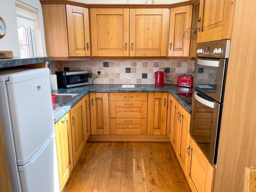 Kitchen area | Pen-y-Bryn - Canllefaes Cottages, Penparc
