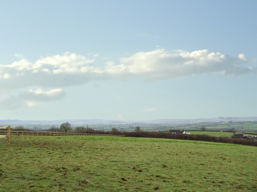 Wonderful far reaching views across the paddock | Bunny Meadows, Llangynog, near Llansteffan