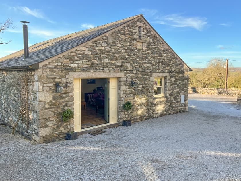 Outdoor area | Spring Cottage - Helm Mount Barns, Barrows Green, near Kendal