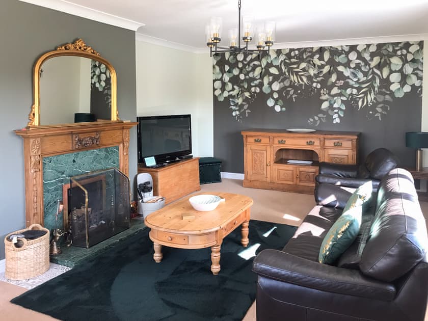 Comfortable living room with a cosy open fire | Carr House, Scarborough