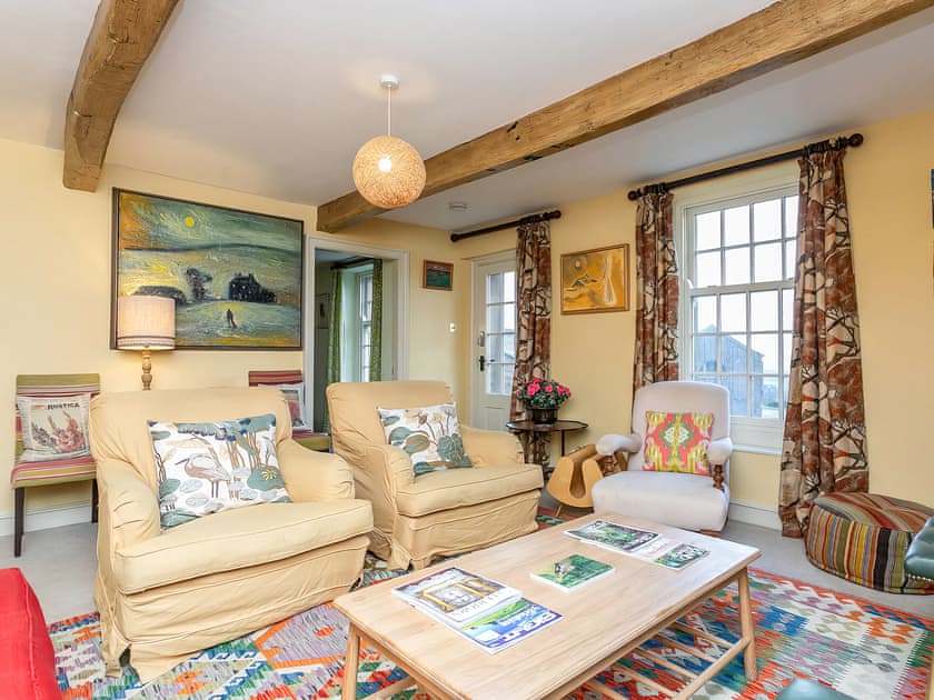 Exposed wooden beams and comfy seating in the living room  | Yellison - Broughton Hall Estate, Broughton, near Skipton
