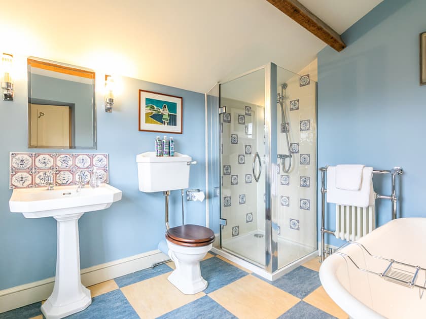 En-suite bathroom with shower cubicle and free standing bath | Yellison - Broughton Hall Estate, Broughton, near Skipton