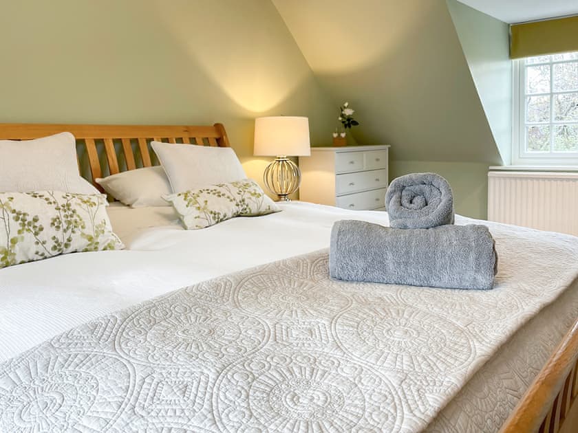 Main bedroom with Super Kingsize bed | The Bothy, Lymington