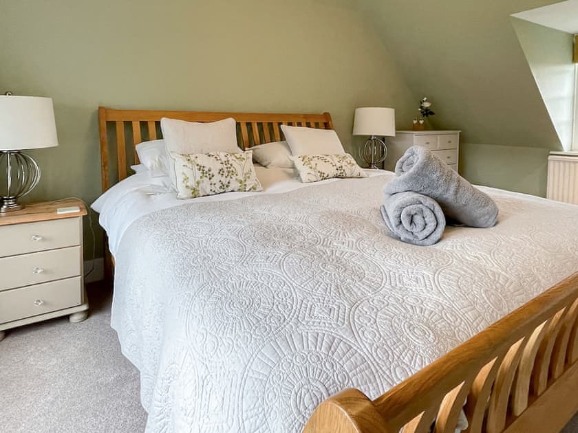 Main bedroom with Super Kingsize bed | The Bothy, Lymington
