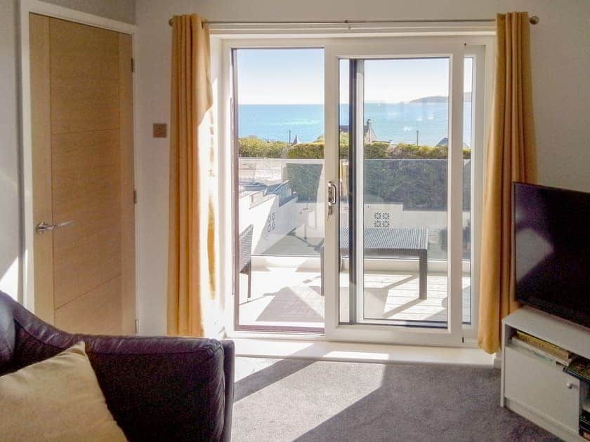 Access to balcony from lounge  | Beach Cottage, Benllech