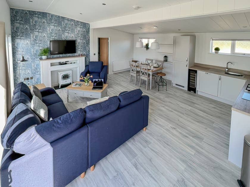 Open plan living, sofa, TV, Dining area and Kitchen | Hoburne, Bodmin