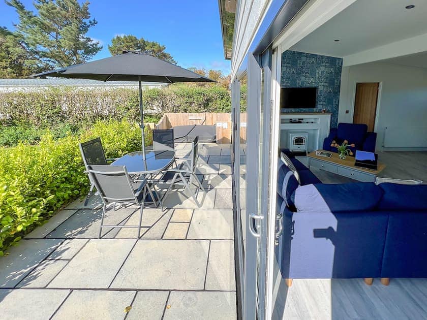 Outside area with table, chairs and 4 person Hot Tub | Hoburne, Bodmin