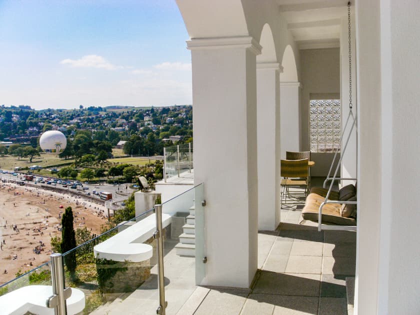 Balcony show the swing seat and view | Riviera Apartment, Torquay