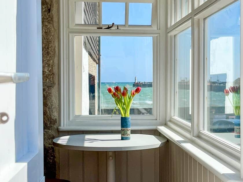 View of Newlyn harbour from bay window and balcony | The Basket Loft, Newlyn