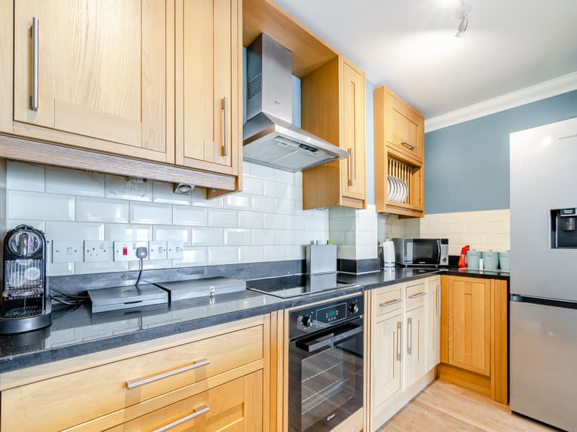 Kitchen area | Bryn Y Mor Apartment, Tenby
