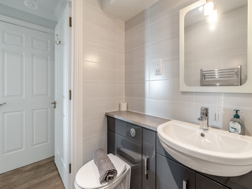 Bathroom | Bryn Y Mor Apartment, Tenby