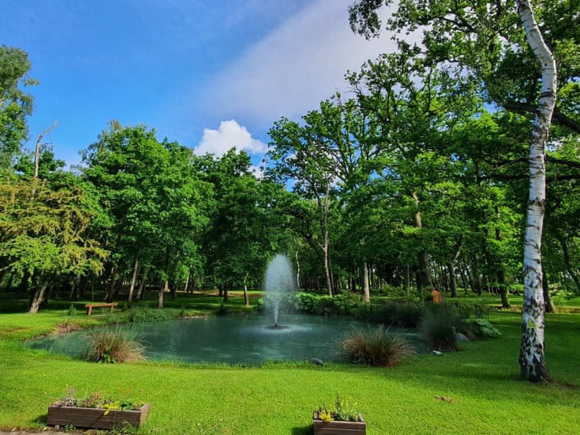 Beautiful surroundings with woodland and fountain | The Lodge, North Duffield, near York