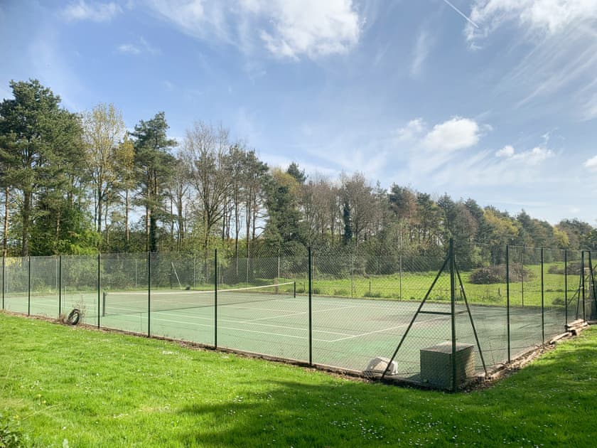 Shared Tennis Court with two other properties | Orchard House, Hempstead, near Holt