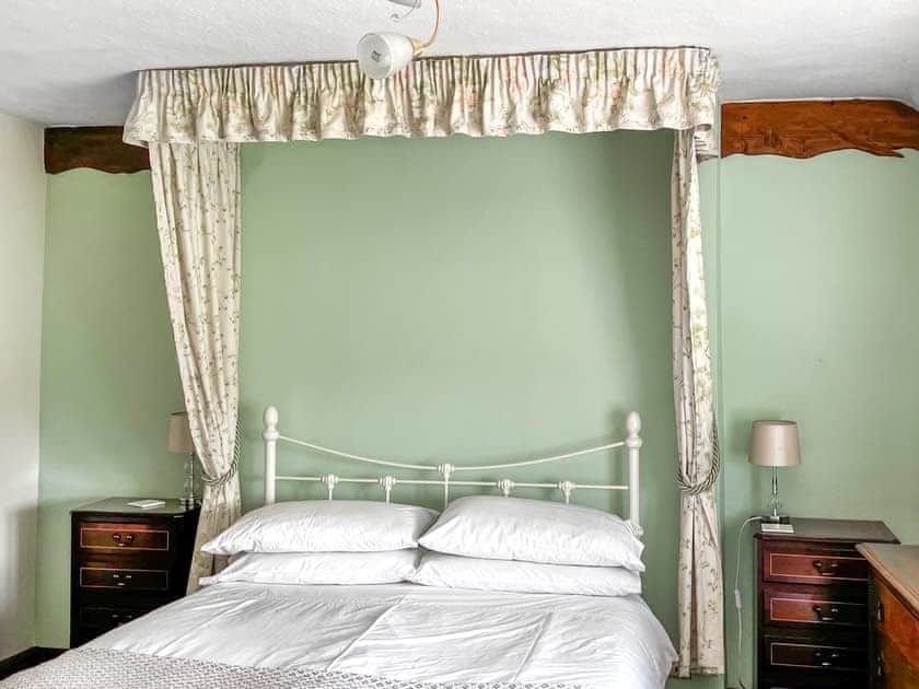 Front bedroom with a double bed and single bed | Throwley Cottage - Throwley Hall, Ilam, near Ashbourne