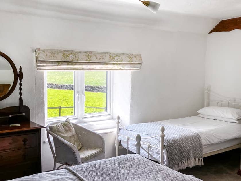 Front bedroom with a double and single bed | Throwley Cottage - Throwley Hall, Ilam, near Ashbourne