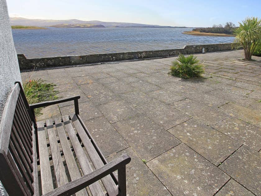 Shared patio area with sea view  | Estuary Flat With Views, Porthmadog