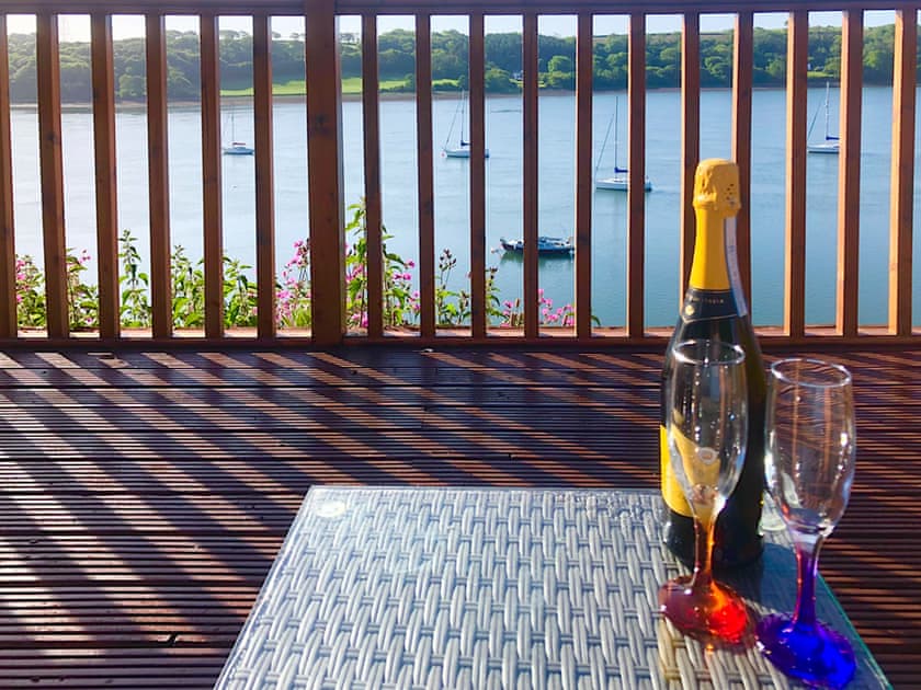 Enjoy a sundowner watching the boats on the river… | Badger Lodge, Burton