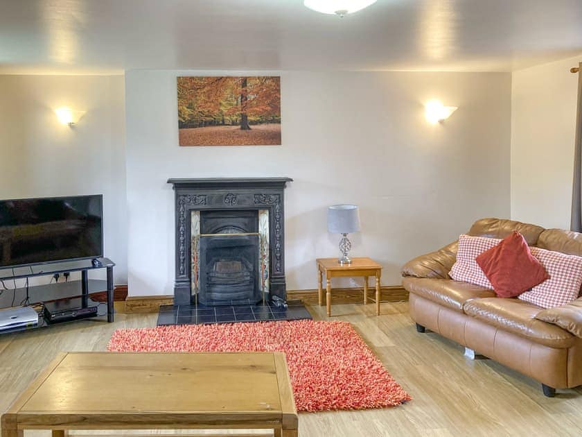 Living area | The Milking Parlour - Harbut Law Holiday Cottages, Alston