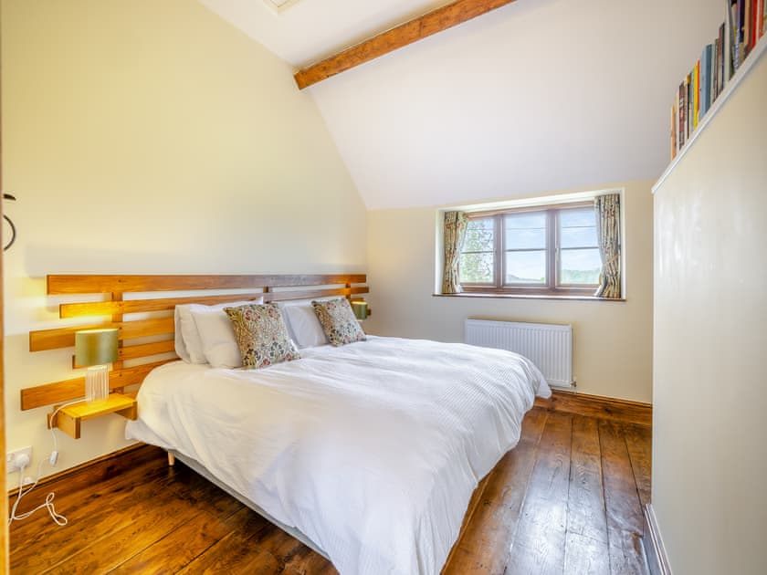 The middle bedroom can be set up either as twin beds, or zipped together as a super kingsize bed as shown | Derwen Deg Fawr, Llanfair Dyffryn, near Llangollen