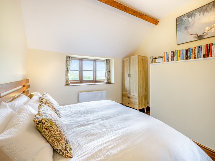 Middle bedroom with super kingsize bed  | Derwen Deg Fawr, Llanfair Dyffryn, near Llangollen